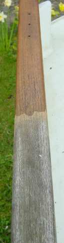 Photo of teak gunwale in course of treatment