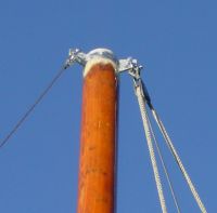 The main halyard sheave fitted to mastband