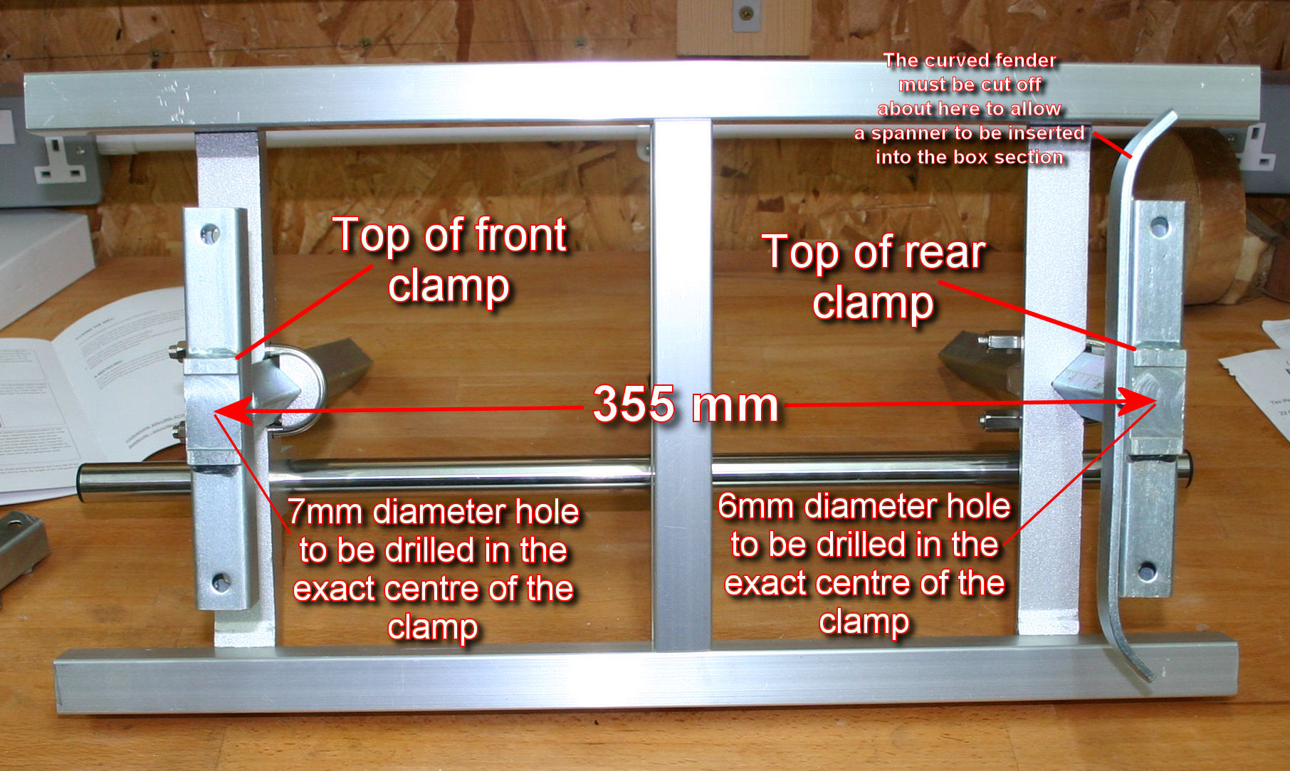 The positioning of new attachment points in the mill clamps.