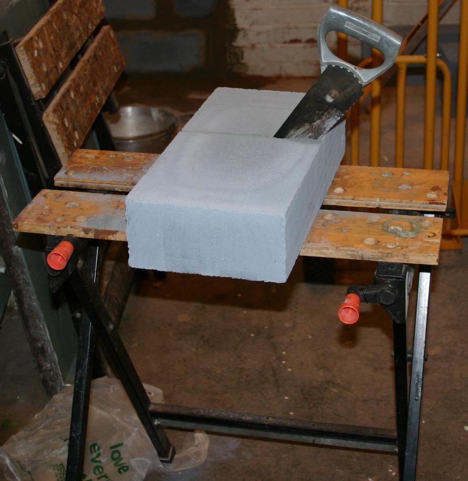 Cutting Aerated Blocks to size with a saw.