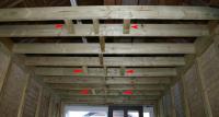 Wooden battens for lighting attachment.