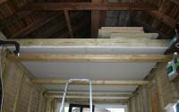 Plasterboard ceiling installation.