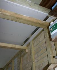 Plasterboard ceiling installation.