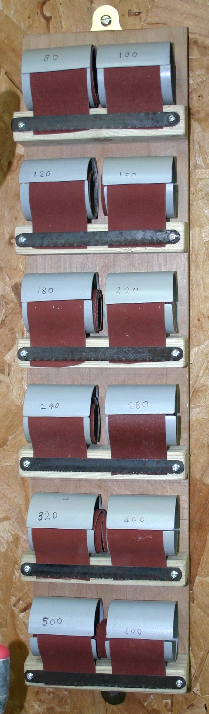 The completed sandpaper dispenser.