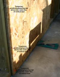 The Durgun Board Lifter in use, supporting an OSB board.