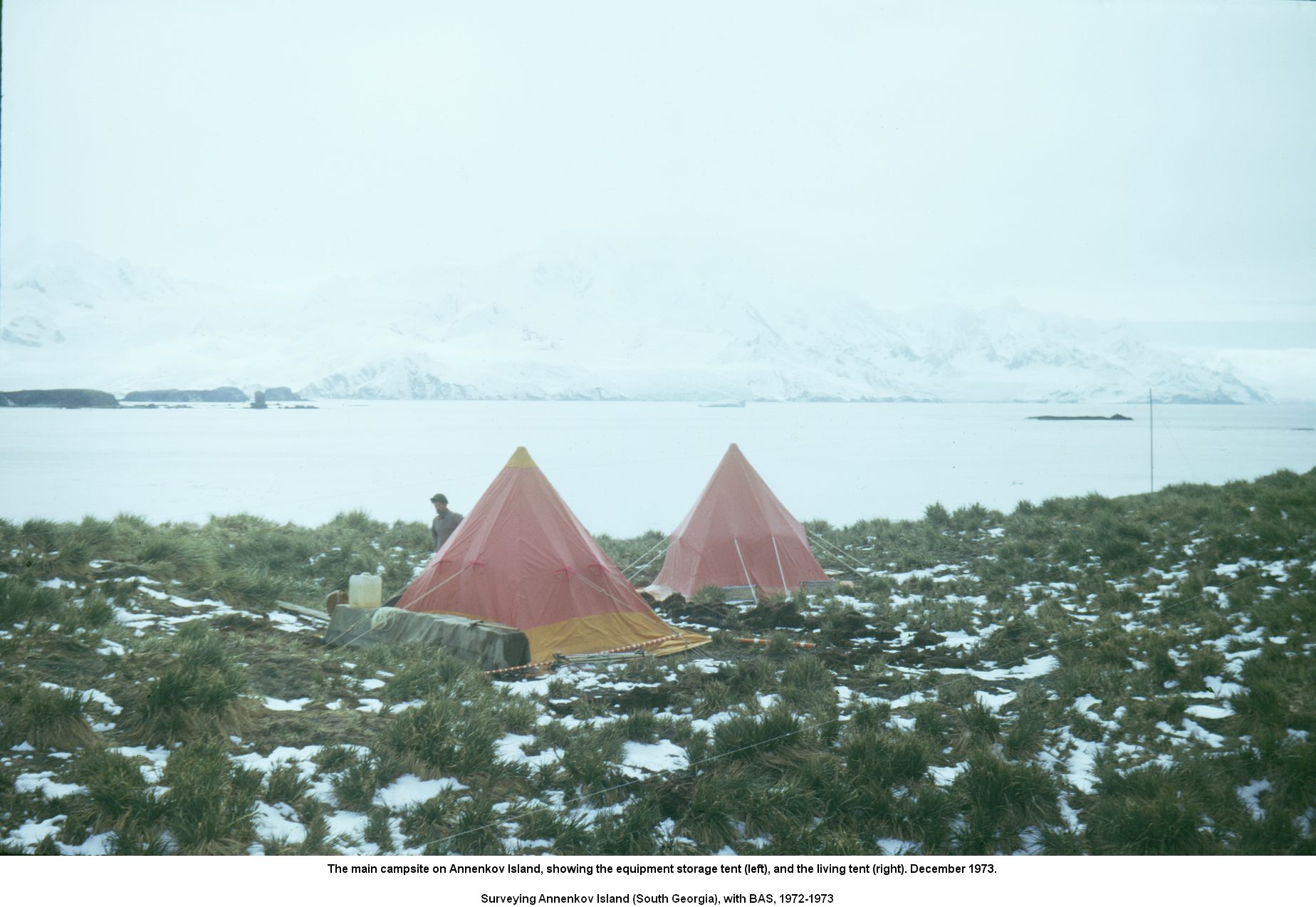 The main campsite on Annenkov Island, showing the equipment storage tent (left), and the living tent (right). December 1973.