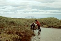 Plane table surveying at the north-eastern end of Fan Lake (at the outflow stream), Annenkov Island. December 1972.