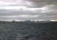 View aft from the RRS John Biscoe during departure from Stanley Harbour (Falkland Islands), 4th November 1972.