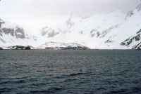 Taken from on board RRS John Biscoe, anchored in Stromness Bay, South Georgia, looking towards the disused whaling Station. About midday, 7th November 1972.