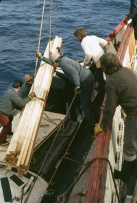 Loading the motor launch of the RRS John Biscoe with supplies & equipment for the scientific party on Bird Island, South Georgia. 13th November 1972.