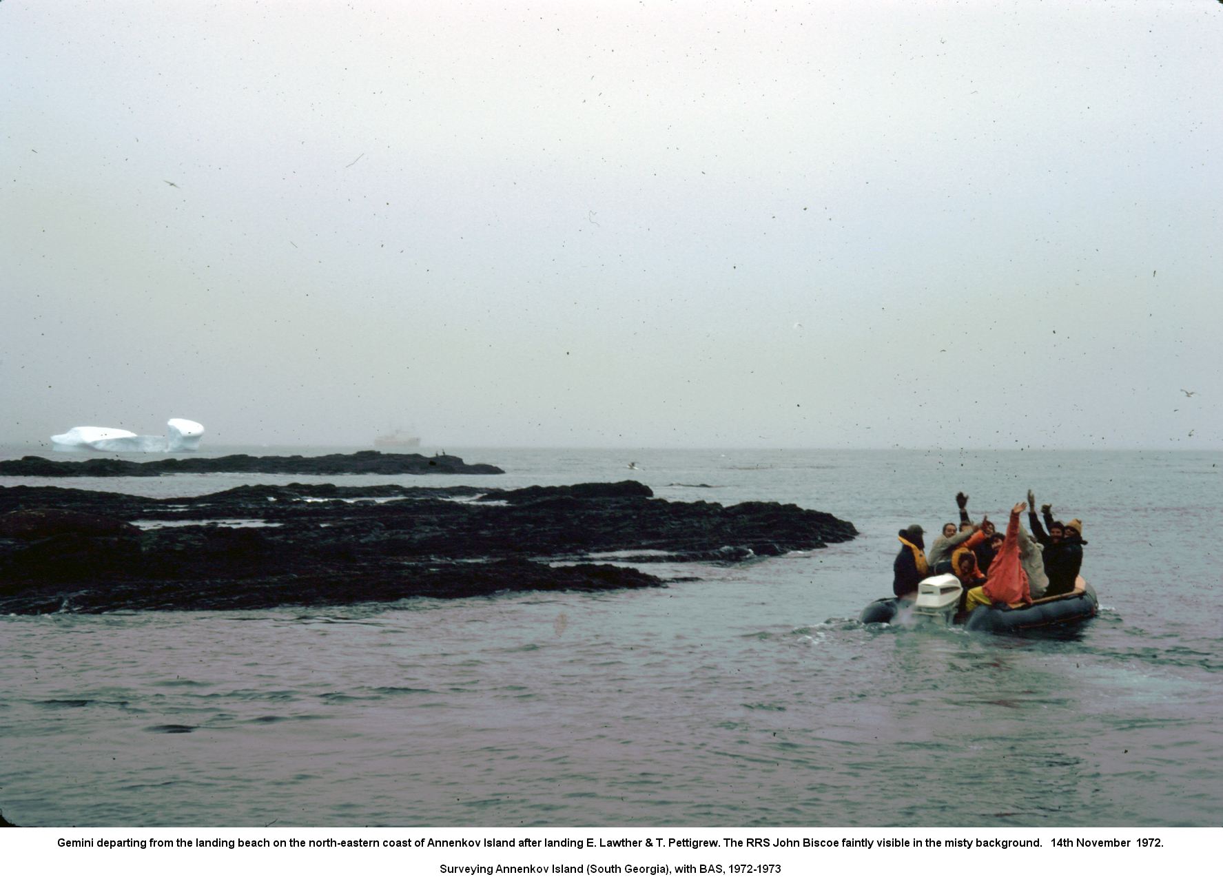 Gemini departing from the landing beach on the north-eastern coast of Annenkov Island after landing E. Lawther & T. Pettigrew. The RRS John Biscoe faintly visible in the misty background. 14th November 1972.