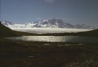 View due east from a point west of Fan Lake (Annenkov Island), looking across the Lake to the Allardyce Mountain Range on South Georgia. January 1973.