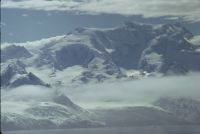 View looking north-east from Annenkov Island showing the Allardyce mountain range on South Georgia. January 1973.