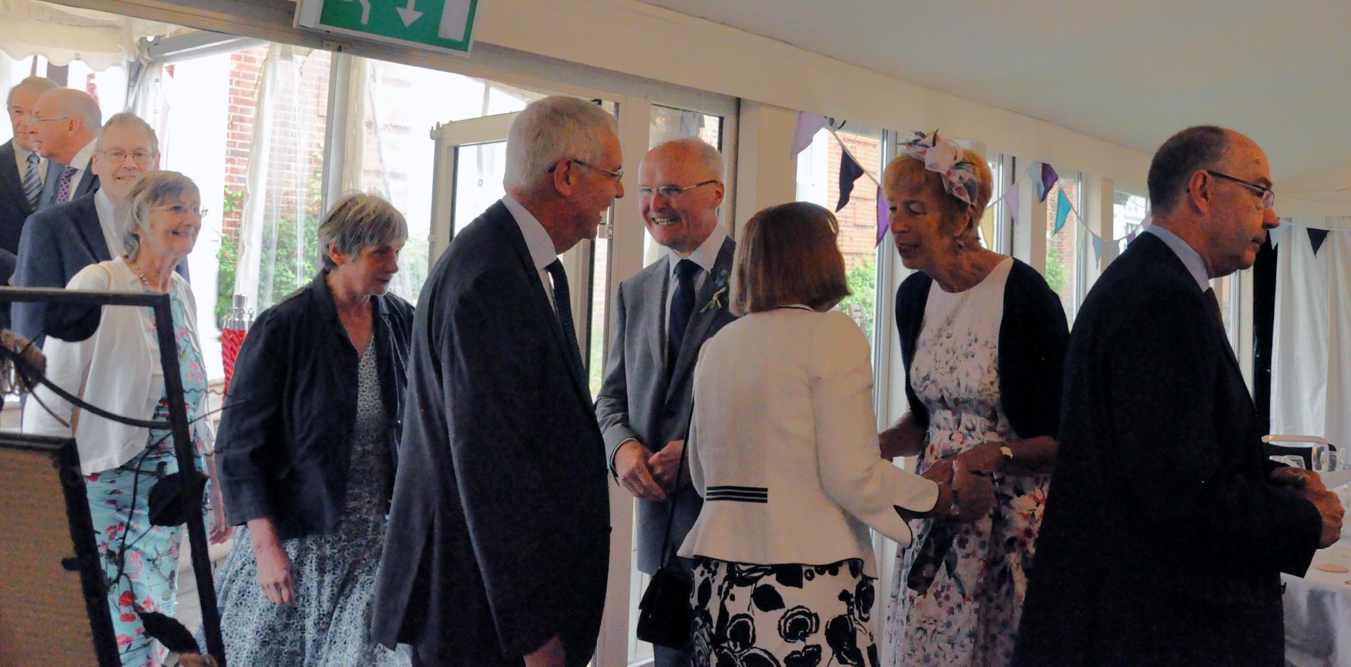Monday 5th June, Trish & Tim welcoming guests into the marquee (Photo by Bedri).