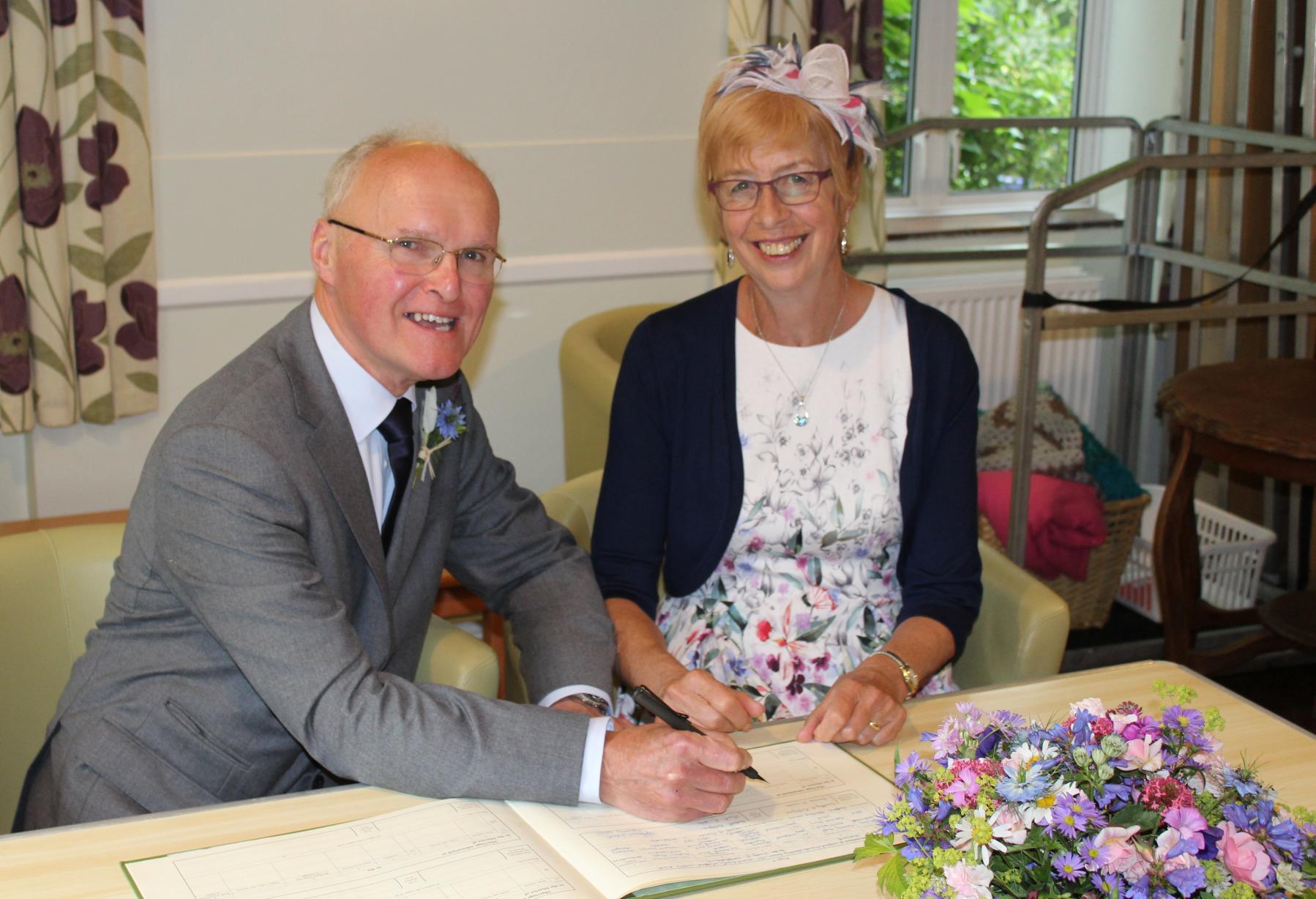 [Monday 5th June, Tim Signing the Register at the Watford Quaker Meeting House.